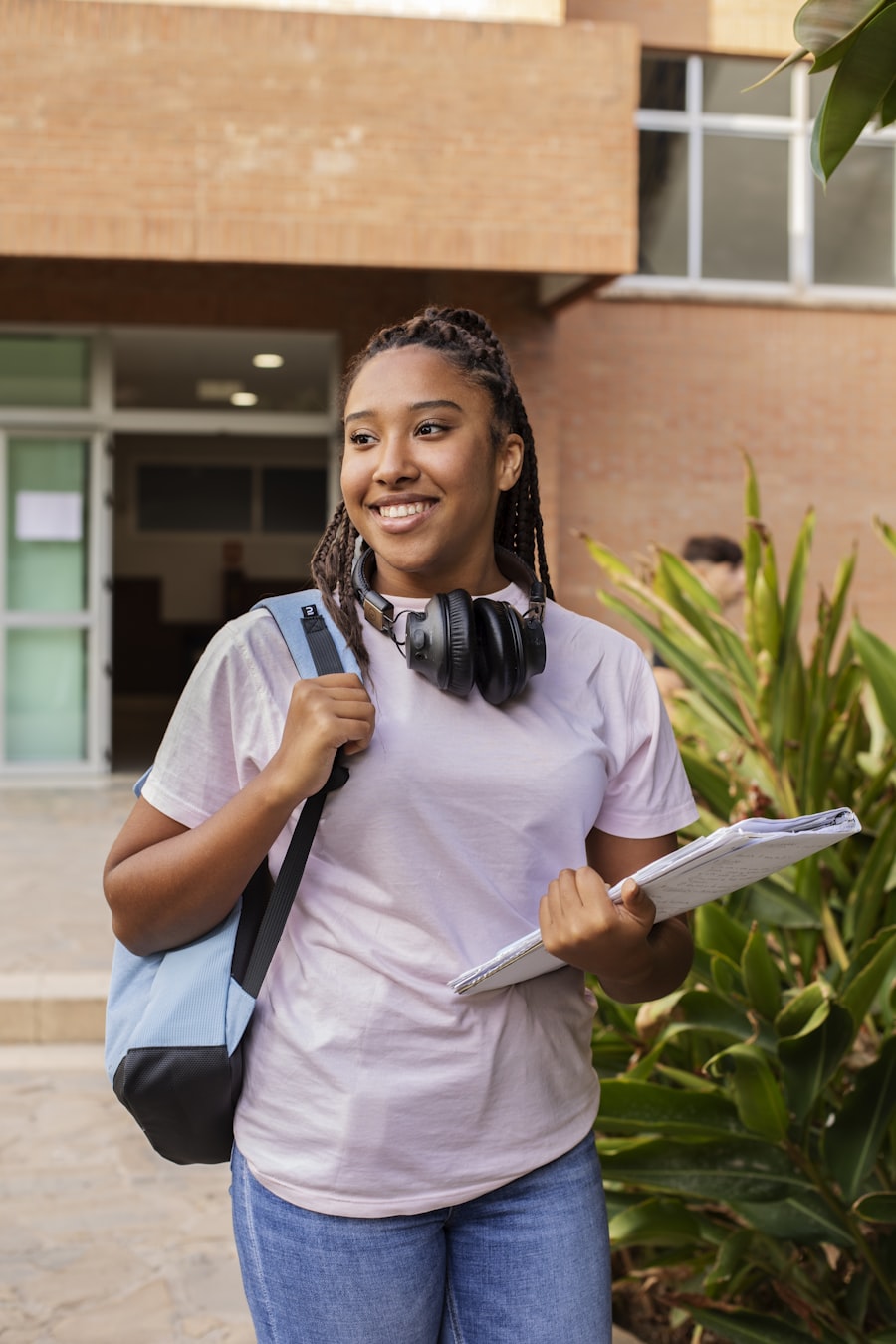 International student walking on campus with a backpack
